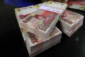 Rupiah Melemah, Tembus Rp16.230 per Dolar AS