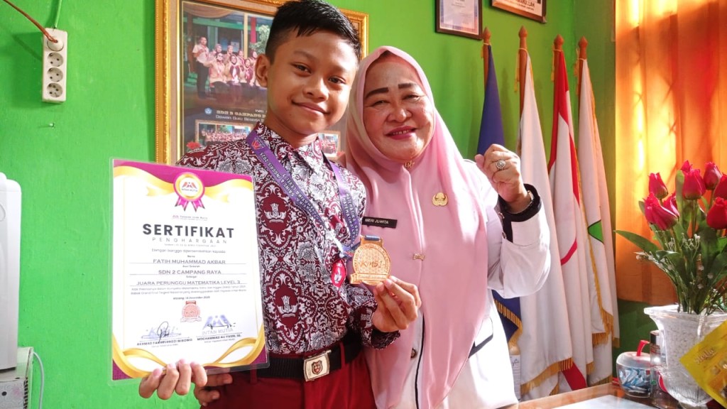 Fatih Muhammad Akbar, siswa Kelas VI SD Negeri 2 Campang Raya, sukses menorehkan prestasi tingkat nasional